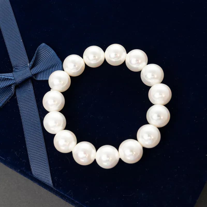 Weißes Muschelkernperlen Armband dehnbar Hochzeitsarmband Brautjungfern Geschenk